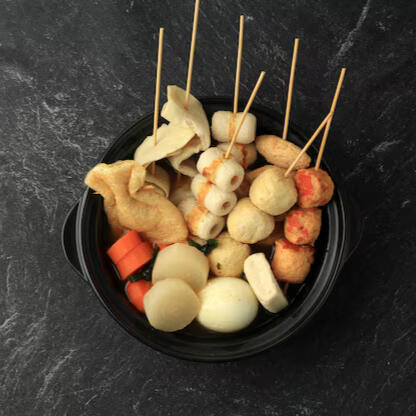 Oden A heaping bowl of juicy fishcakes, tender daikon, hearty boiled eggs, and other savory ingredients steeped for hours in a warming broth. Avaliable Vegetarian Style