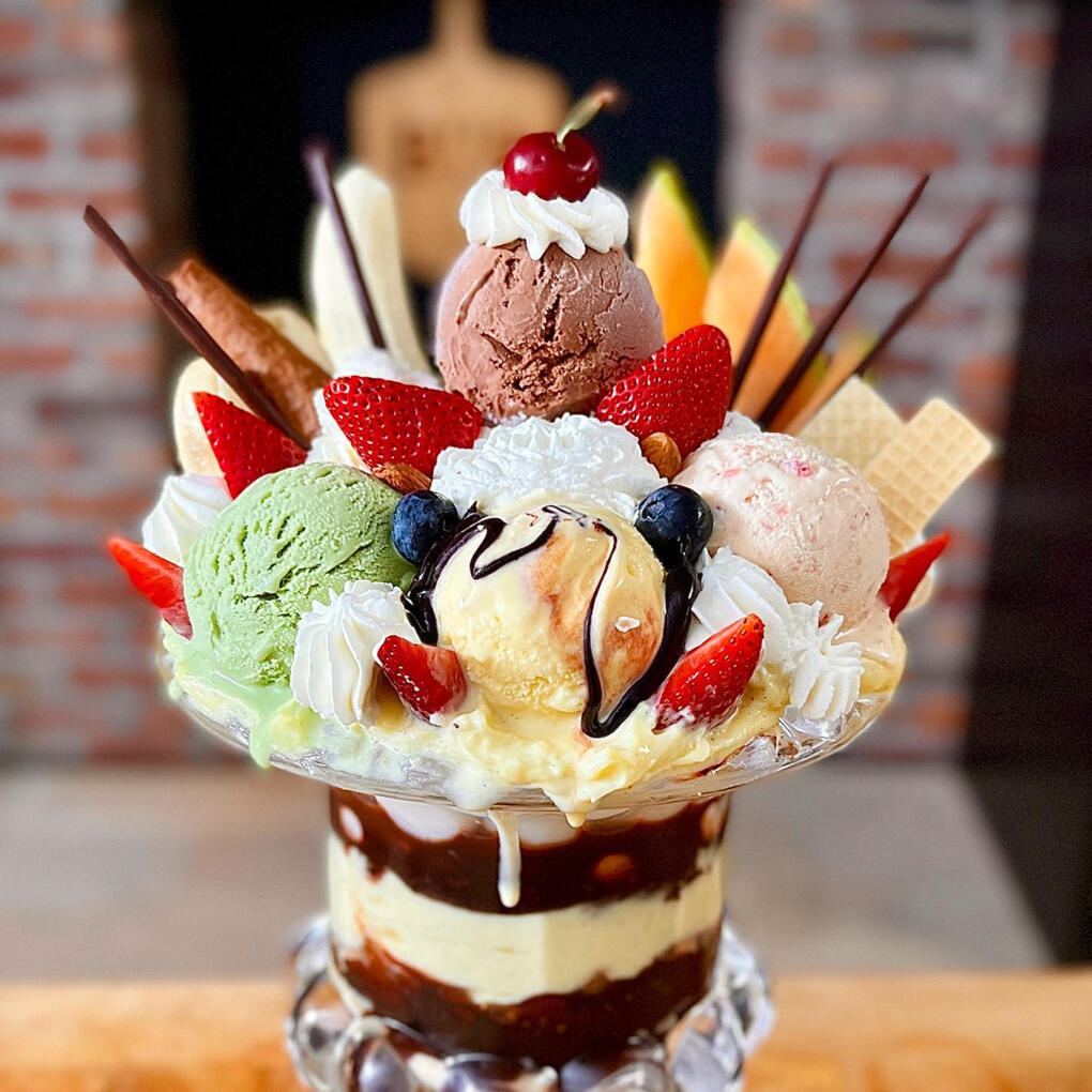 The Legendary Parfait A massive dessert layered with plenty of fresh fruit, whipped cream, and frozen confectionary.