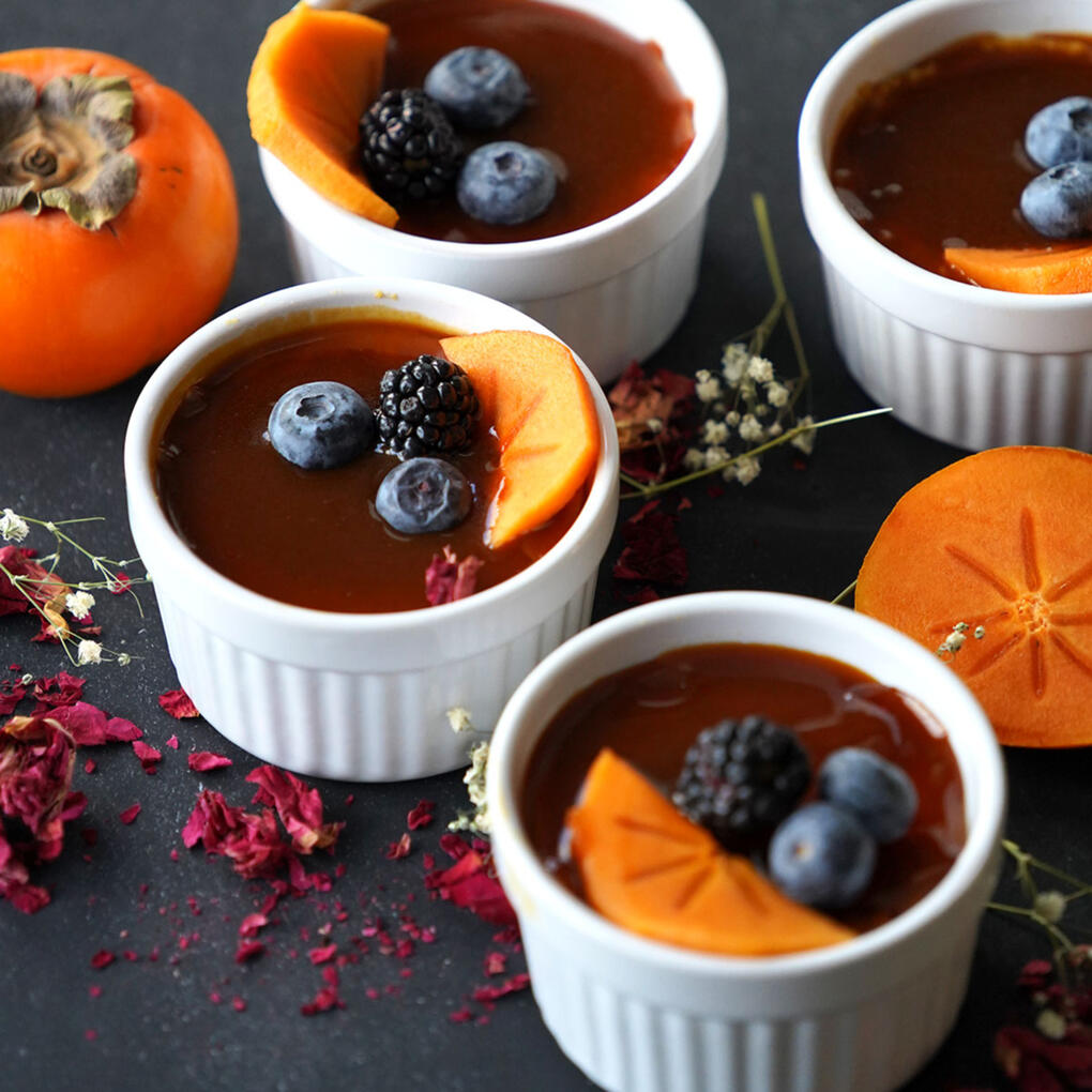 Persimmon Pudding A rich steamed dessert made with puréed persimmons and eggs.