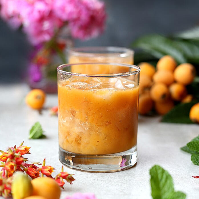 Loquat Juice A thick, orange juice freshly squeezed from ripe loquats.