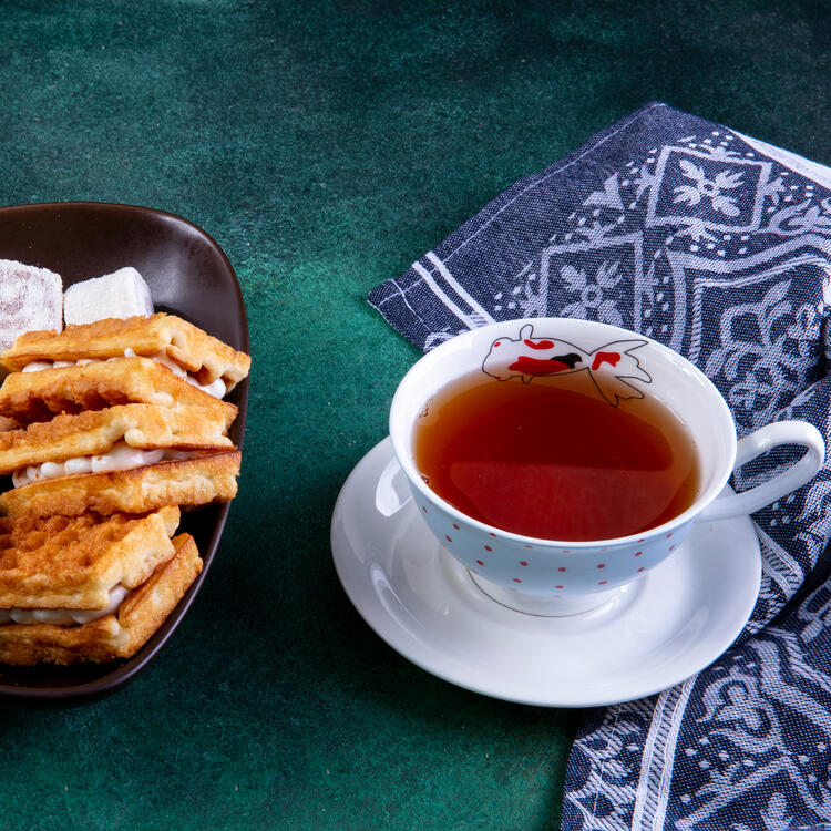 Shroud Mint Tea Served with Cookies and Finger Sandwiches