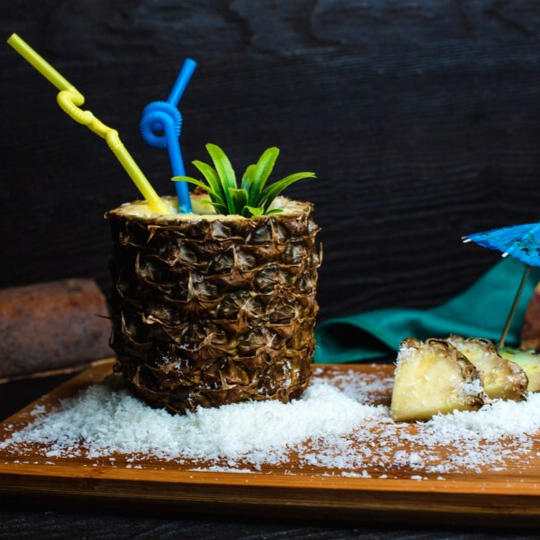 Piña Colada A Turali cocktail of rum, cream of coconut, and pineapple juice, blended with ice.