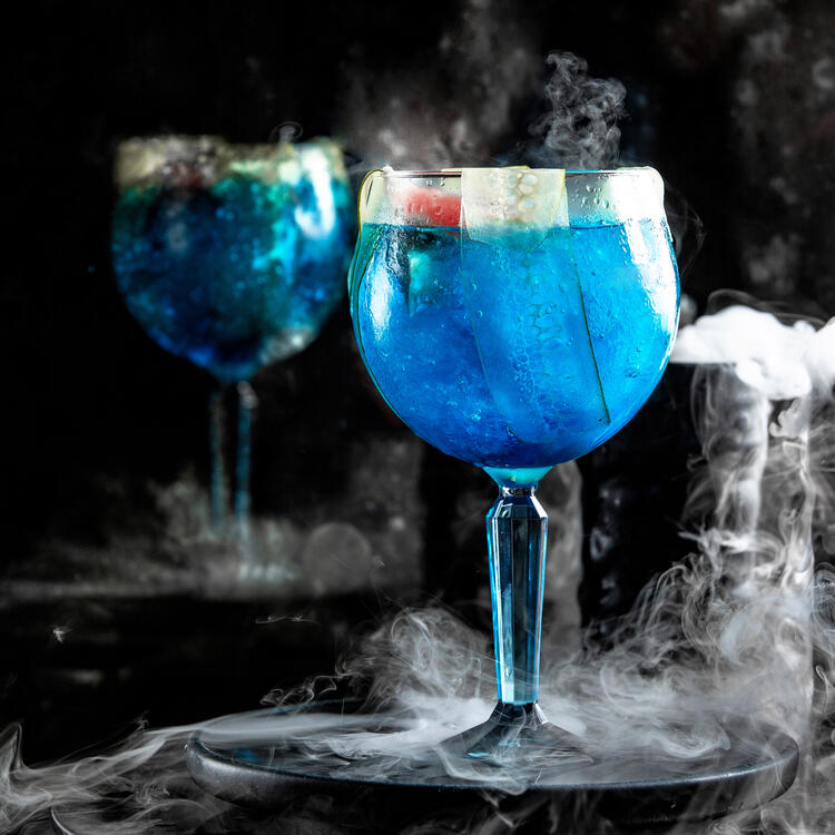 The Costa del Sol A tropical cocktail made of rum, pineapple juice, blue bitter orange liqueur, and sweet and sour mix.